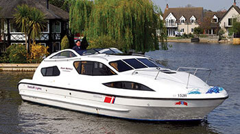 A man enjoying a norfolk broads boat hire